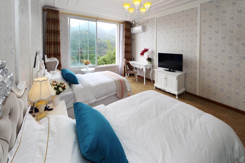 Panshan Tingquan Tuwo Holiday Resort เล่อซาน ห้อง รูปภาพ