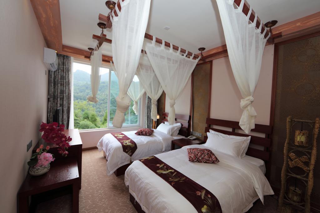 Panshan Tingquan Tuwo Holiday Resort เล่อซาน ห้อง รูปภาพ