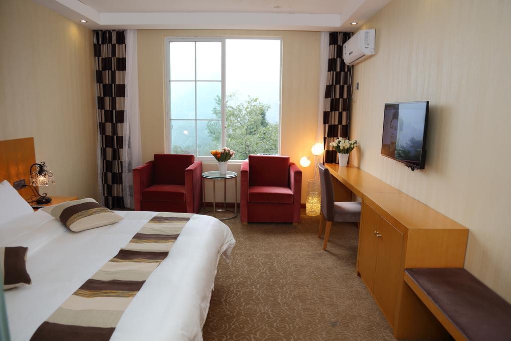 Panshan Tingquan Tuwo Holiday Resort เล่อซาน ห้อง รูปภาพ