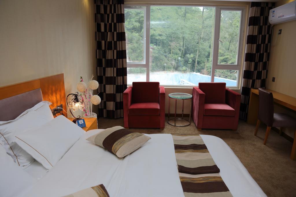 Panshan Tingquan Tuwo Holiday Resort เล่อซาน ห้อง รูปภาพ