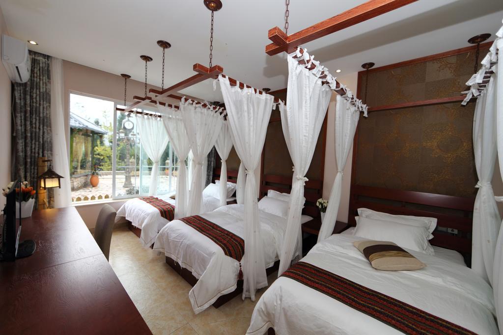 Panshan Tingquan Tuwo Holiday Resort เล่อซาน ห้อง รูปภาพ