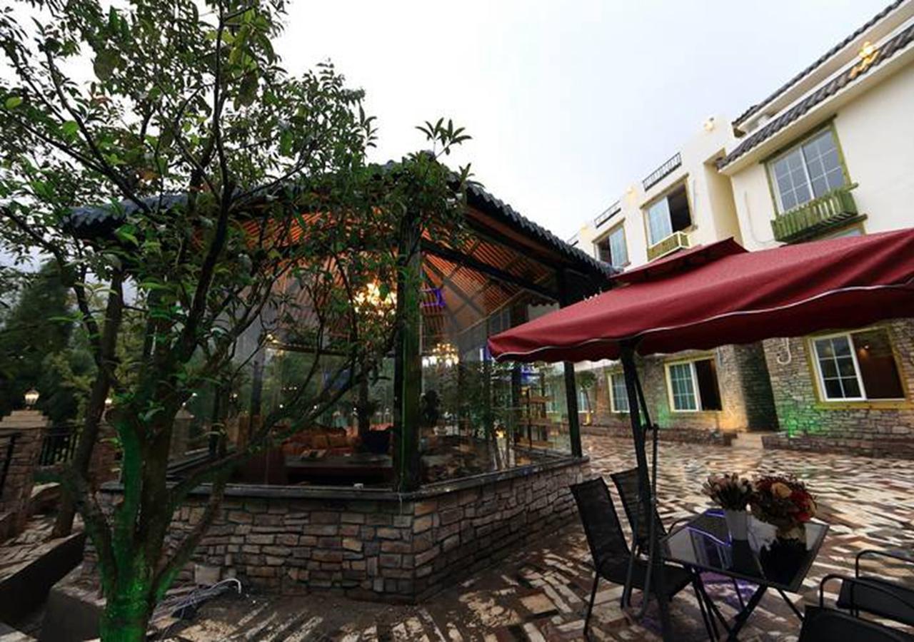 Panshan Tingquan Tuwo Holiday Resort เล่อซาน ภายนอก รูปภาพ